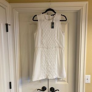 Tibi cream, sleeveless, silk dress with embroidered detail on front